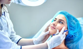 cosmetologist-is-caring-patient-s-face_397897-926